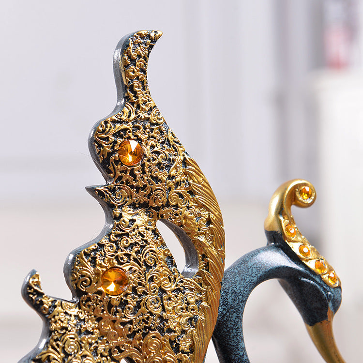 Elegant decorative piece with intricate gold designs and embellishments, perfect for home decor.