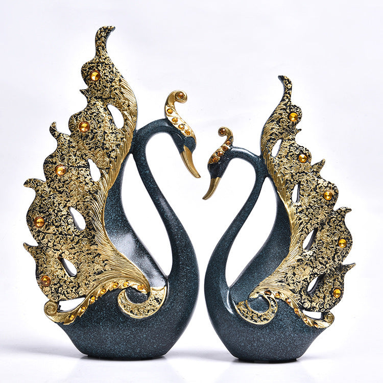 Elegant couple swan decoration with ornate gold detailing, perfect for home decor.