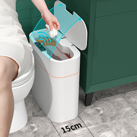 Touchless smart trash can in bathroom with automatic lid, enhancing cleanliness and convenience for waste disposal.