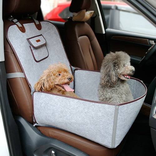 Retro dual-purpose pet car mat front seat cushion with adjustable straps and storage pocket, waterproof nylon design with two small dogs inside.