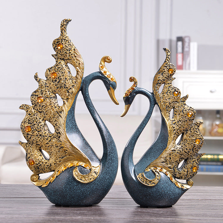 Elegant couple swan decoration in blue and gold, symbolizing love and beauty for home decor.