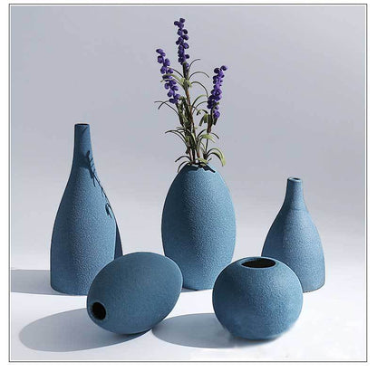 Dried Flowers Home Decoration in a rustic vase for elegant décor.